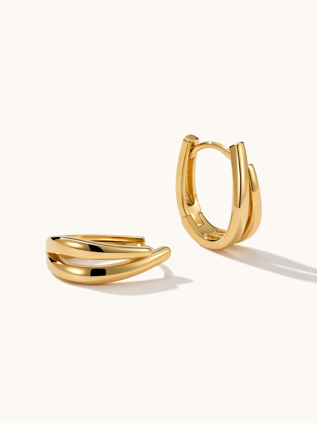 Ovale Huggie Hoops Ohrringe Gold Silber